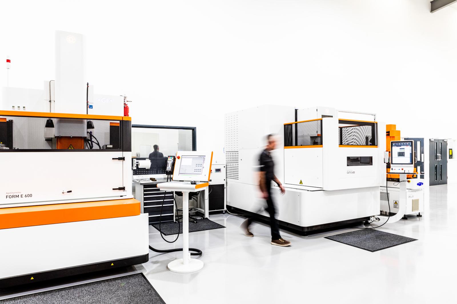Clean modern manufacturing facility floor with machinery