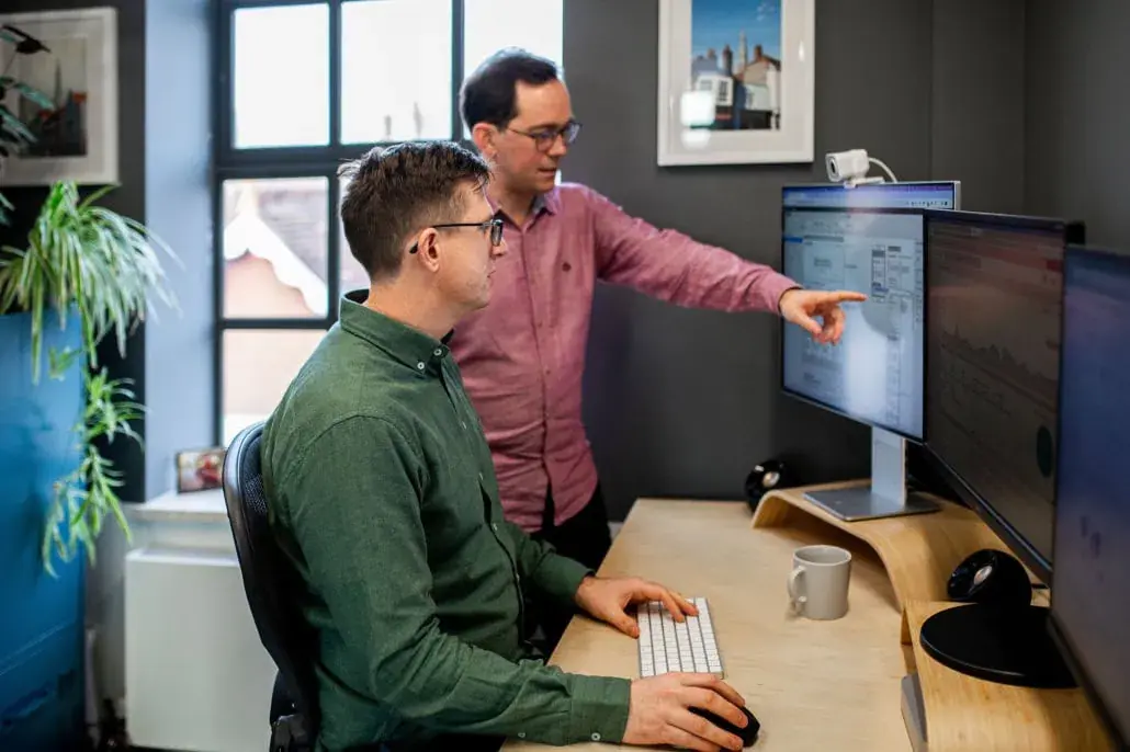 Ben and Simon, the Pallant marketing specialists, reviewing a website on screen together