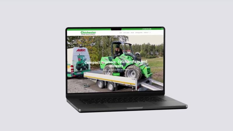 Chichester Farm Machinery website shown on a laptop