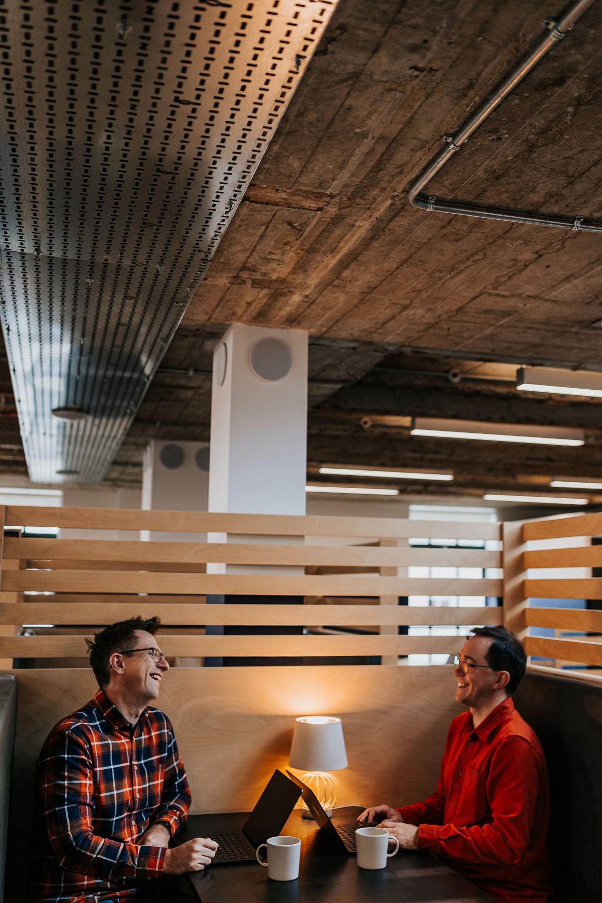 Pallant team meeting privately in a studio booth