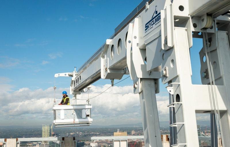 Zarafa façade access building maintenance unit with an operator in the cradle on a high-rise